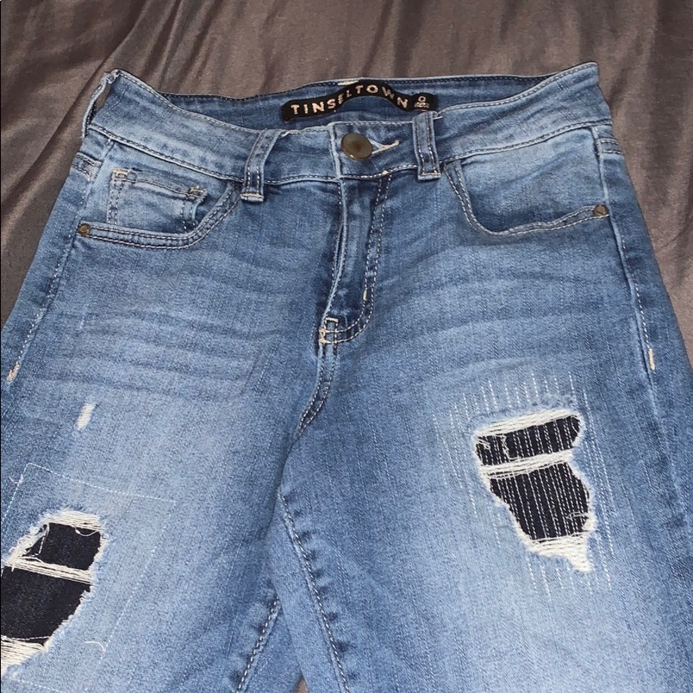Cloth under rips jeggings